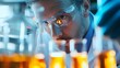 A male scientist carefully analyzing samples in a laboratory with glowing blue test tubes. Focused Scientist Working in a Modern Laboratory 