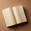 © umut hasanoglu - An open blank book with cream pages on a warm brown textured surface, symbolizing creativity and potential storytelling.