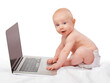 © T. Rose/peopleimages.com - Baby, laptop and studio for entertainment, fun and games in child development and progressive technology. Infant, happy and toddler for home, diaper and white background for playful and portrait