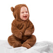 © T. Rose/peopleimages.com - Studio, toddler and onesie with costume, bear and child with joy and fun. Baby, newborn and happiness with adorable, comfort and dressed up infant for development isolated on white background