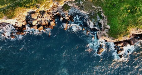 Wall Mural - Bulgarian nature landscape of sunrise over rocky cliffs beach shore, Black sea coast, Bulgaria aerial top view