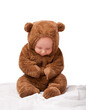 © T. Rose/peopleimages.com - Growth, development and portrait for baby in studio with bear costume or pajamas against white backdrop. Boy, child or toddler with teddy clothes and adorable and cute for bed, cuddle and cozy