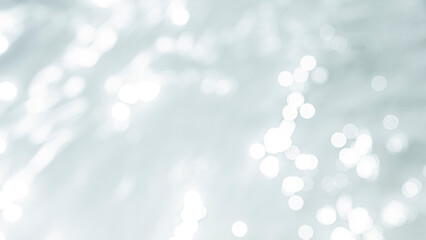 Wall Mural - white wave abstract or rippled water texture background,closeup of desaturated transparent clear cal