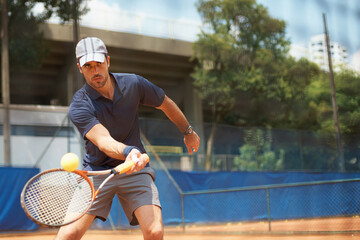 Poster - Fitness, sports or tennis and man with racket hitting ball on court for competition, game or match. Exercise, health and training with confident young athlete person outdoor in summer for action