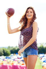 Canvas Print - Happy woman, football and playing at outdoor festival for game, match or catch in nature. Young female person with ball and smile for friendly sport or activity at summer party, camp site or event