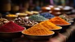 Fragrant bright multi-colored spices of Asian cuisine lie on a wooden table. Theme of aromatic seasonings from around the world.