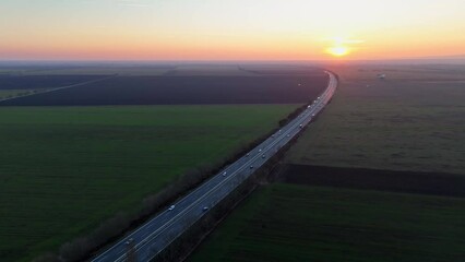 Wall Mural - Drone view of Highway line transportation with cars and Truck, Traffic at sunset