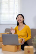 © David - Startup small business entrepreneur SME freelance woman working with box, Young Asian small business owner office online market packing delivery, SME delivery e-commerce telemarketing seller concept