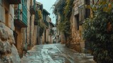 Fototapeta Uliczki - Historic street with old stone buildings, ideal for travel websites