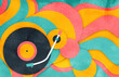 © IKON Images - Record player in colourful abstract pattern