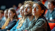 © Olya Komarova - A group of listeners in the audience at a scientific lecture about innovative discoveries in science