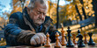 Elderly man with Down syndrome playing chess in the park. Learning Disability