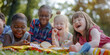 © Lila Patel - Group of kids with Down syndrome having a picnic in the park. Learning Disability