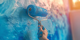 Fototapeta  - Hand hält Malerrolle mit blauer Farbe