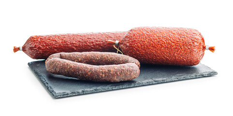 Wall Mural - Smoked salami sausages isolated on white background.