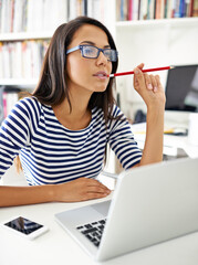 Canvas Print - Student, woman and laptop at library at college, thinking or stress with problem solving for education. Girl, person and computer at university for learning, research or bite pencil to study for exam