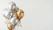 Silver and Golden balloons with ribbons on white background.	
