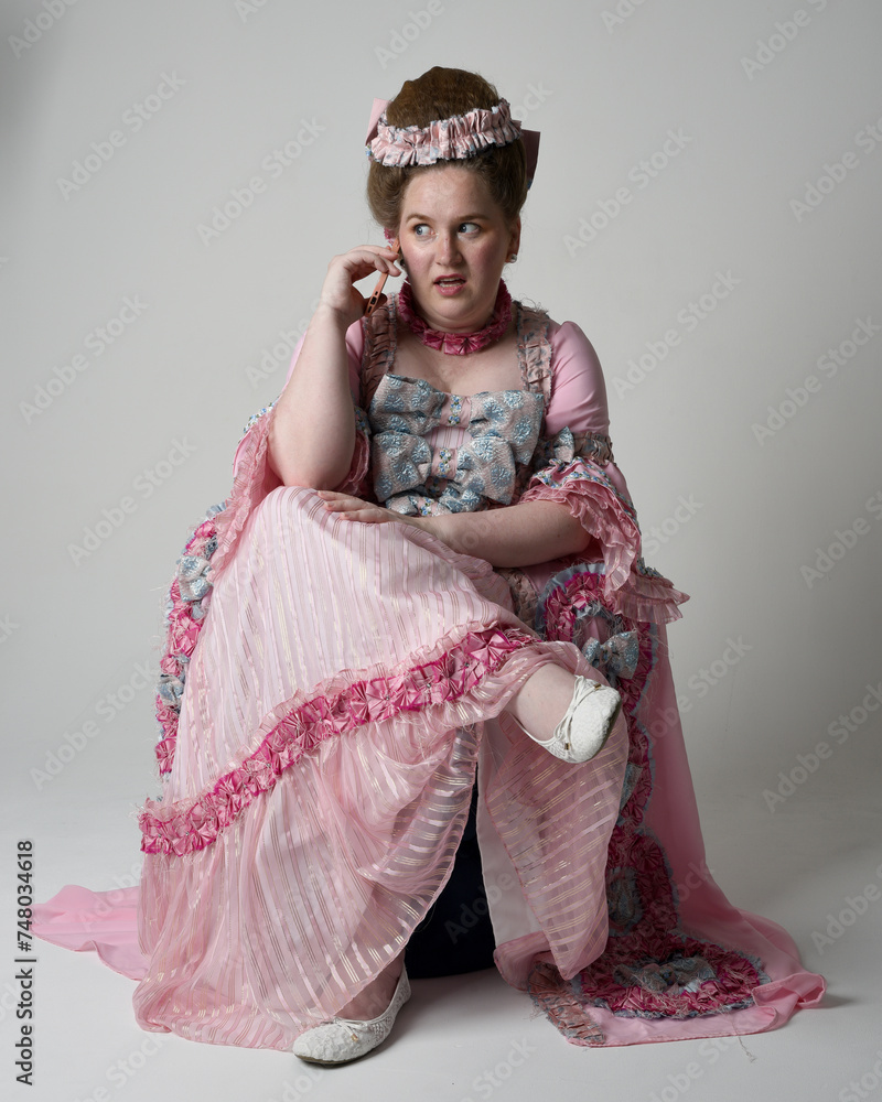 Nobility Style Full length portrait female model wearing opulent pink gown costume of ...