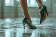 Womans Feet in Elegant Dark Green Heels