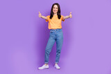Fototapeta Panele - Full body photo of young administrator woman in yellow t shirt show double thumbs up respect you isolated on purple color background
