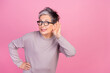 Closeup photo of pensioner grey haircut lady touch ear eavesdropping listen information empty space isolated on pink color background