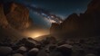 sunrise in the desert _A night scene with the milky way galaxy and stars over a rocky landscape.  