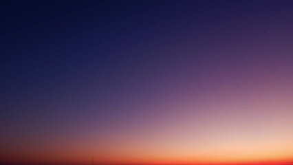 Wall Mural - 4K : Sunrise sky time lapse - Timelapse footage captures the vibrant colors of the sunrise sky, as golden hues blend with soft pinks and purples. Wisps of clouds dance gracefully.
