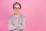 Fototapeta Panele - Portrait of folded arms successful business woman retired age looking empty thoughtful brainstorming isolated over pink color background