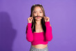Photo of funky fooling girl wear pink top making ponytail mustache isolated purple color background