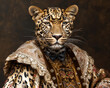 A striking portrait of an African leopard its spots complementing the intricate patterns of a sumptuous