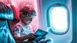 Adorable Child boy sits by the window at plane soars through the sky, reading a book. Childhood wonder during an airplane journey