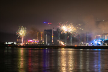 Wall Mural - Fireworks in the city at night, close-up of photo