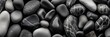 Black and white pebbles background. Abstract background of stones. Travel and vacation concept with copy space. Spa Concept.