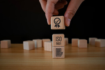 ISO certificate icon on  wooden cubes, warranty, standardization, certified, quality, control. Quality control certification and standardization. International standards quality assurance concept.