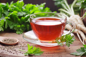 Canvas Print - Parsley tea with fresh seeds, leaves, roots nearby on rustic wooden table, copy space, natural remedy for kidney, heart, menstrual, blood desease, healthy organic food concept