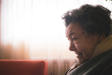 Wall Mural - portraits of an old woman in her home