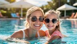 Fototapeta  -  Mother and daughter enjoy a summer afternoon in a swimming pool, both wearing sunglasses and smiling. Their playful interaction and shared fun capture the essence of a family vacation