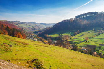 Wall Mural - rural landscape of carpathian mountains. beautiful countryside scenery in autumn season with fields 