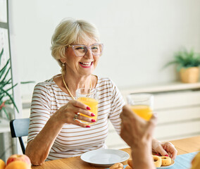 breakfast woman man senior couple home retirement wife husband elderly together happy morning old happiness kitchen love mature eating meal retired