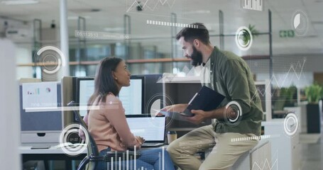 Wall Mural - Animation of data processing over diverse male and female colleague discussing at casual office