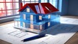 A blue transparent 3D model of a simple house with a red roof over architectural blueprint plans with a pen and pencil on the side