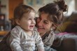© Jelena - Mother tenderly playing with her baby Sharing a moment of love and gentle play in a cozy home setting