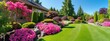 Front yard, landscape design With multicolored shrubs intersecting with bright green lawns Behind the house is a modern, garden care service, green grass with a beautiful yard for the background.