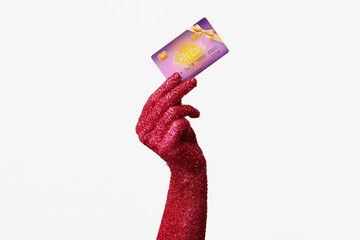 Sticker - Female hand covered with glitter and gift card on white background, closeup