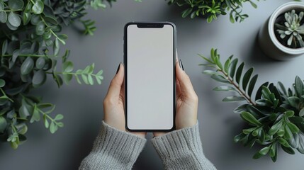 Poster - A close-up of hands using a mockup of a smartphone in an office setting.