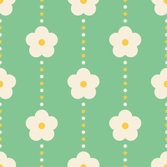 Wall Mural - White and yellow flowers on green dotted background. Vector seamless pattern in soft retro pastel colors.