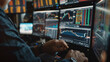 Working with real-time stocks on a computer with multiple monitors is a financial analyst.