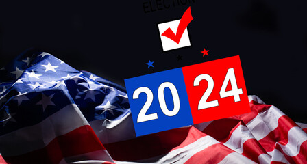 Wall Mural - Presidential Election 2024 text on a mini chalkboard over a vintage background with part of the American Flag. Top view.