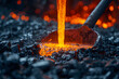 Hot molten metal being poured into a furnace with sparks, close-up.