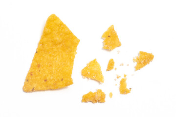 Crashed of crispy corn tortilla nachos chips with crumble isolated on white background clipping path